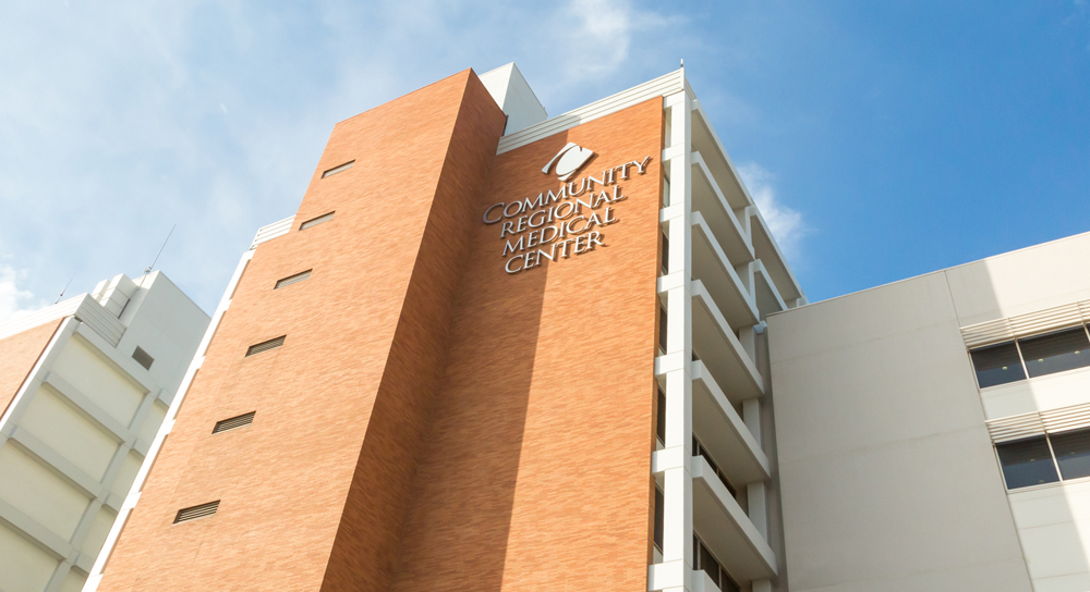 close up of Community Regional Medical Center logo on the building