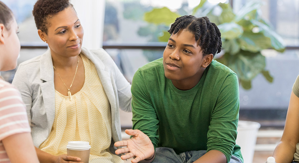 two youths having a discussion