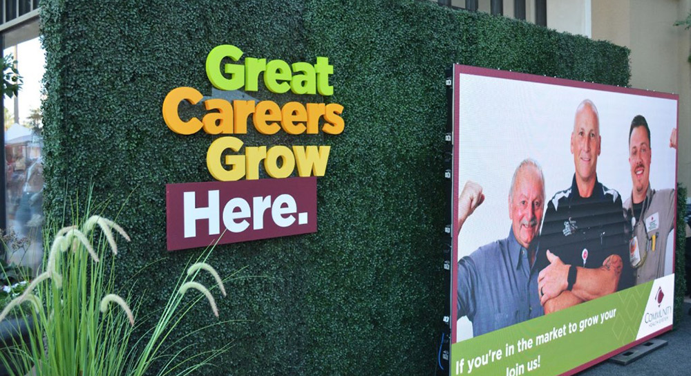 Great Careers Grow Here outside River Park Farmers Market