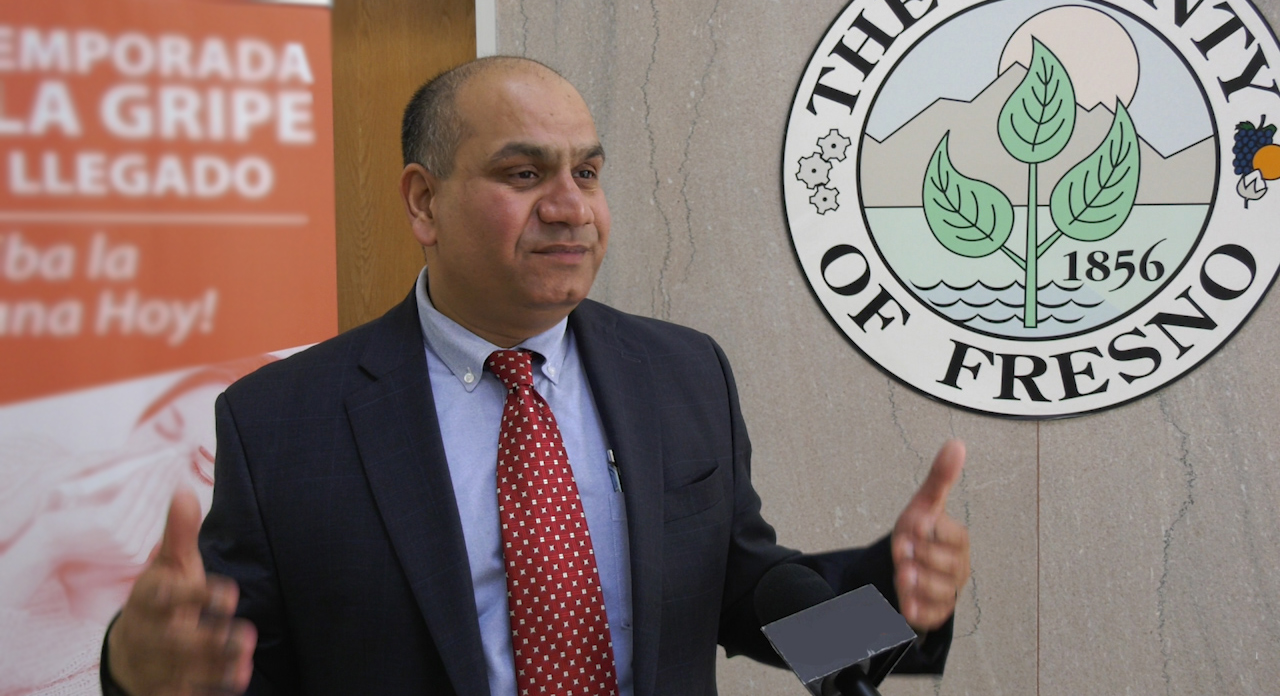 Dr Vohra speaking at a press conference