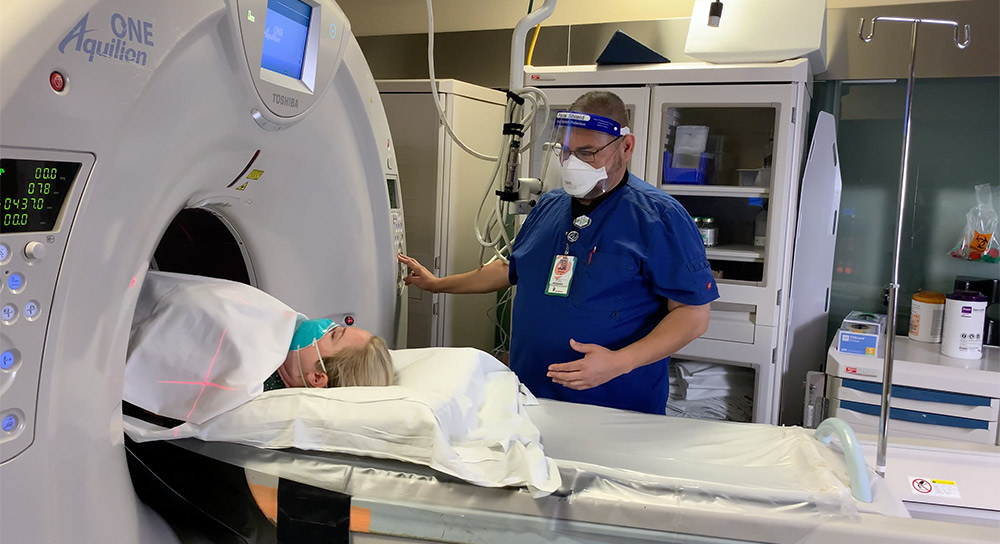 A patient is rolled into an MRI machine