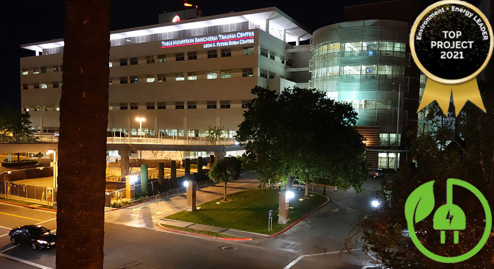 An exterior shot of Community Regional at night